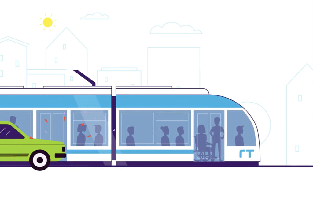 Visualisierung einer Straßenbahn vor Autos und Häusern.