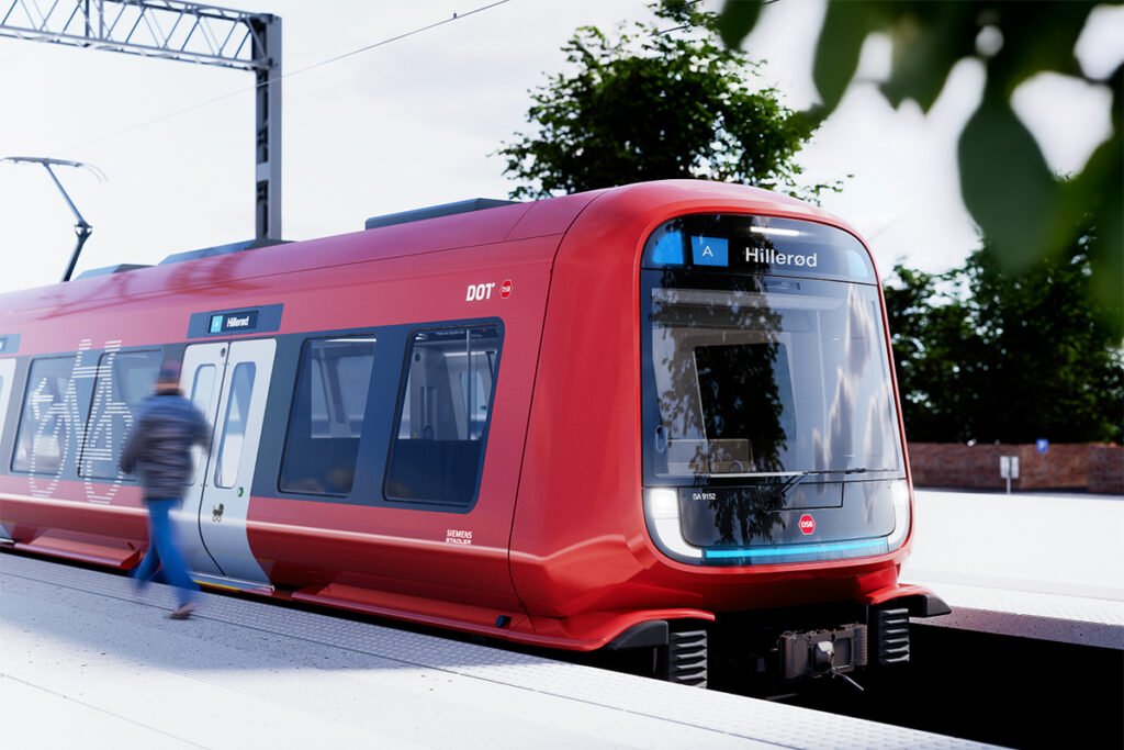 Darstellung eines Zuges an einem Bahnsteig.