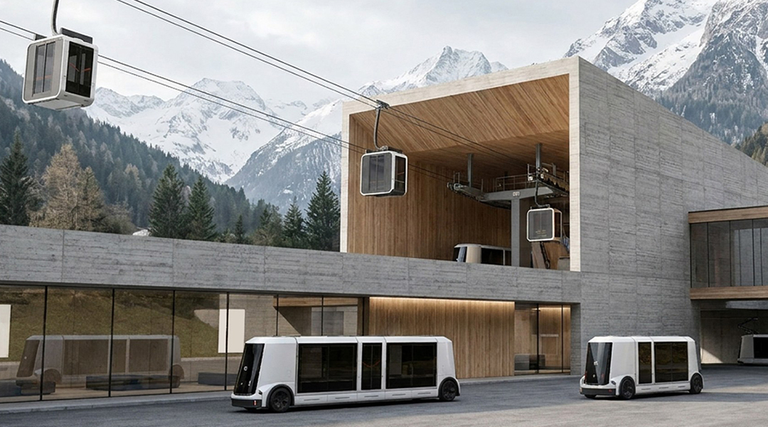 Fahrzeuge halten vor einer Seilbahn-Station.