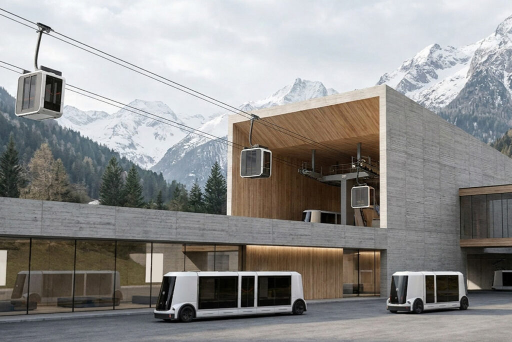 Fahrzeuge halten vor einer Seilbahn-Station.
